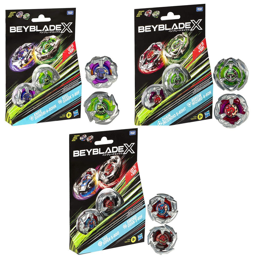 Three Beyblade X toy packages featuring colorful spinning tops, with additional loose tops displayed beside them