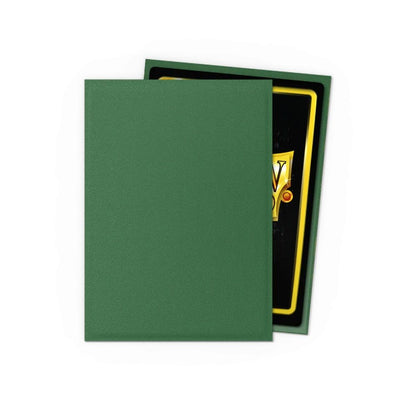 Forest Green textured card sleeve protecting a partially visible black TCG card with gold border