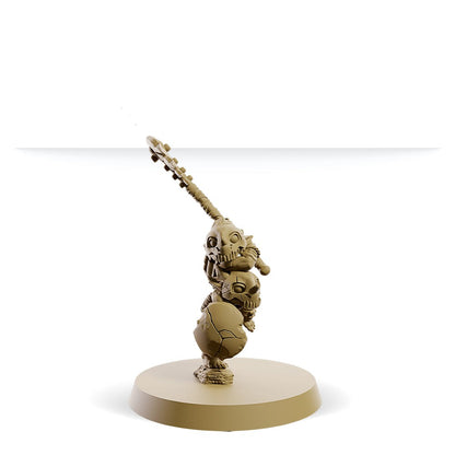 Fantasy miniature, a small creature standing on stacked skulls, holding a spiked banner pole