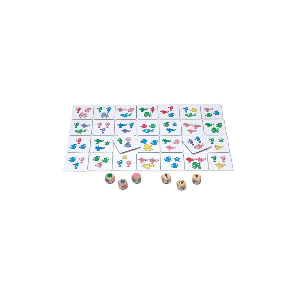 Children's memory game tiles featuring colorful sea creatures and several wooden dice