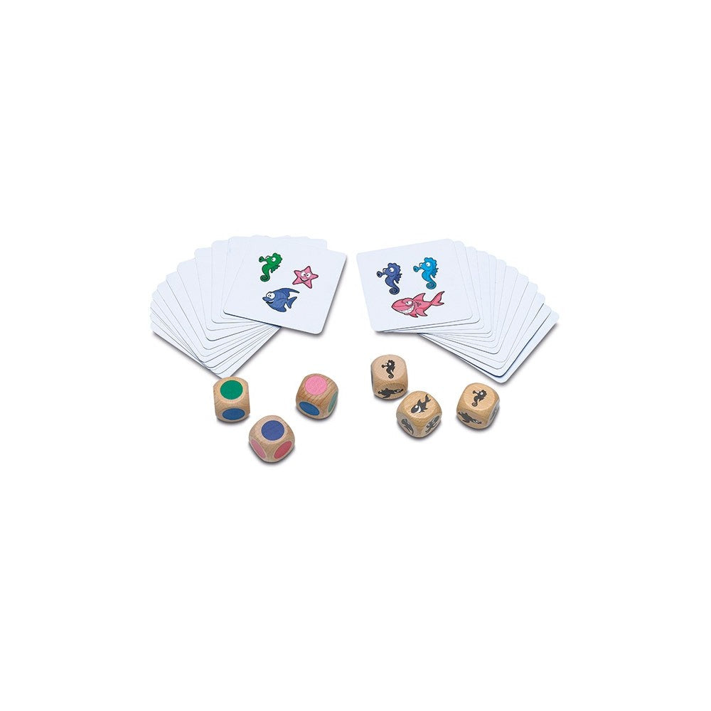Board game set with six wooden dice and stacks of cards showing colorful sea animal illustrations