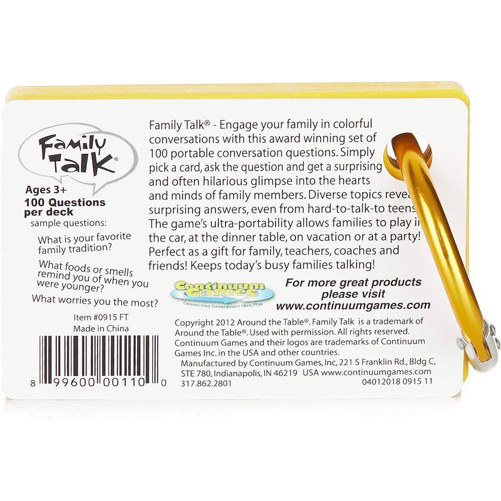 The back of the Family Talk conversation card game is shown, detailed with product info, sample questions, a barcode, and secured by a large golden carabiner
