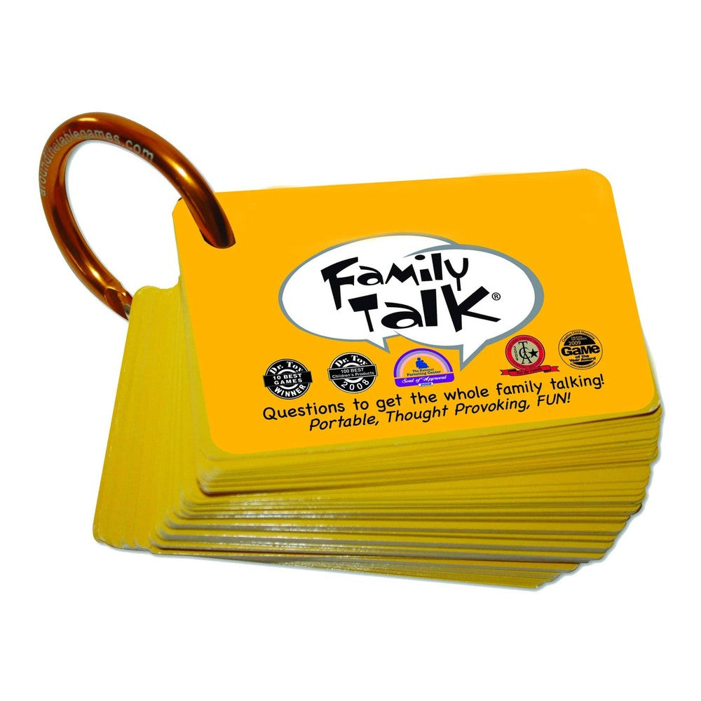 A stack of bright yellow Family Talk conversation cards bound by a large bronze ring is displayed against a white background