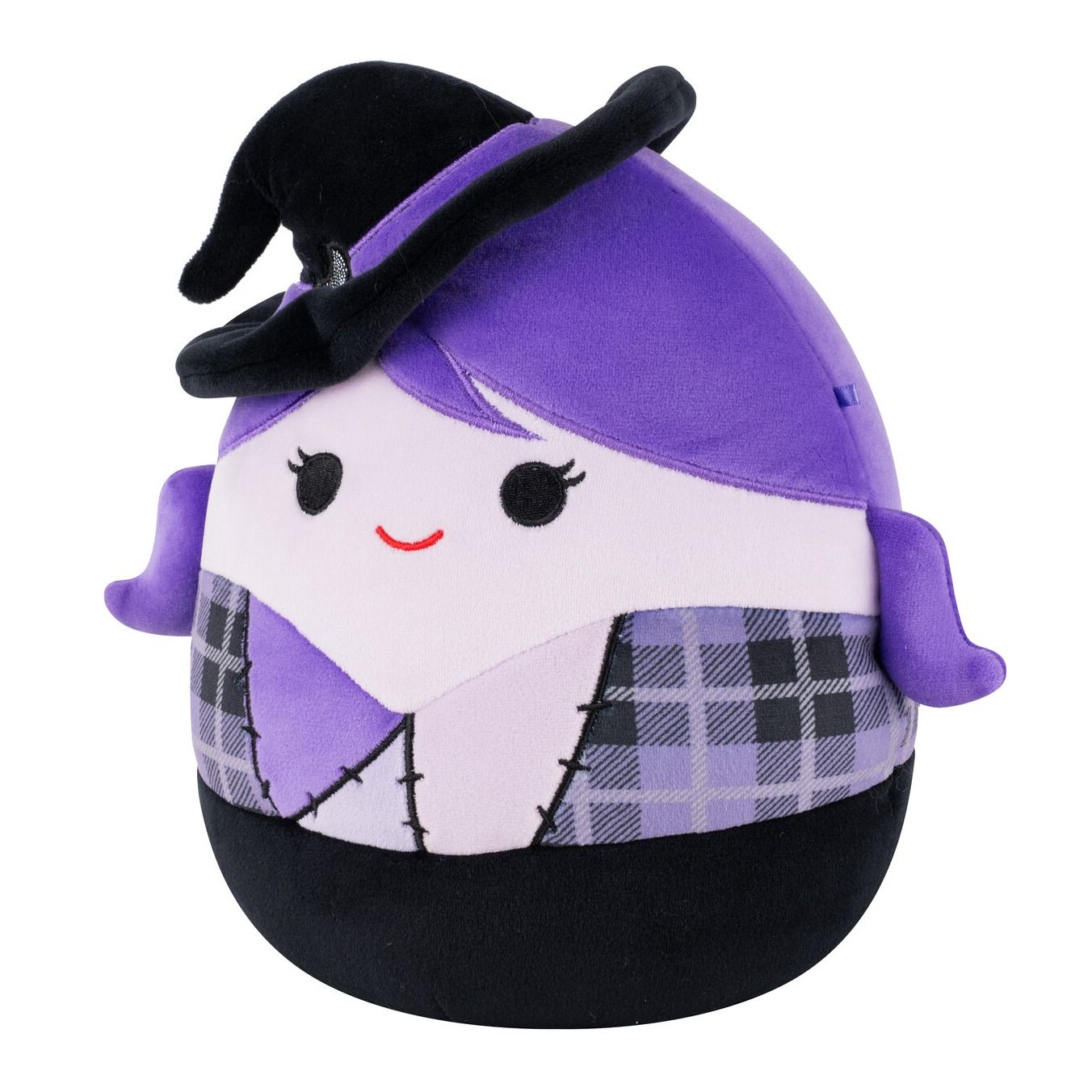 A purple witch Squishmallow plush toy with a black hat, light pink face, and a patched body with purple plaid patterns