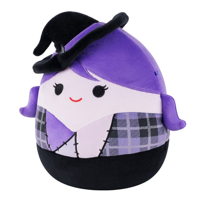 A purple witch Squishmallow plush toy with a black hat, light pink face, and a patched body with purple plaid patterns