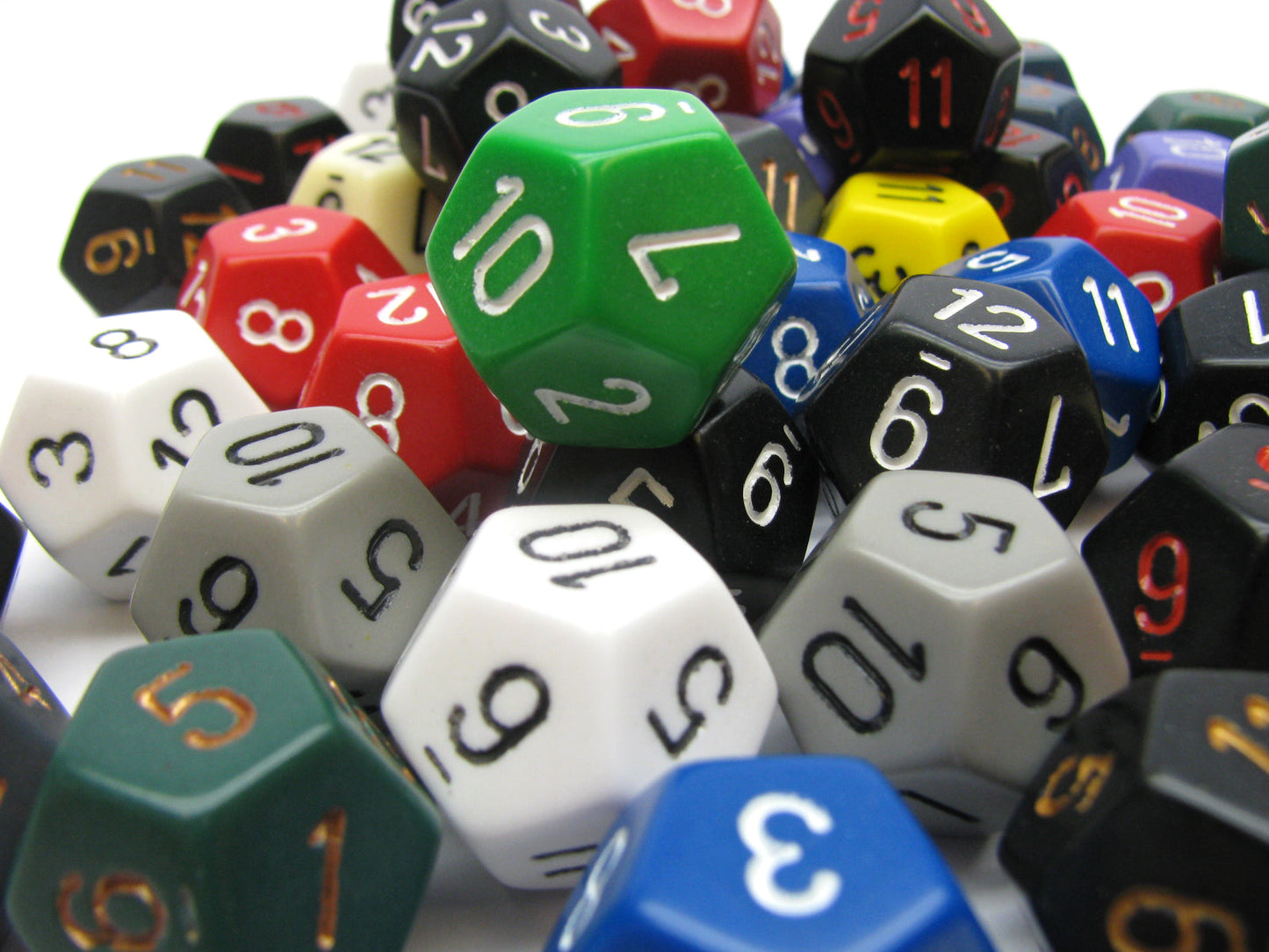 Assorted Chessex Opaque Polyhedral D12 dice set featuring various colors like green red black white and blue showcasing numbers 1 through 12