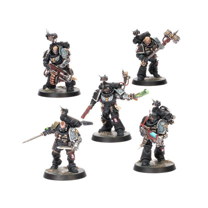 Five painted black Space Marine miniatures (Deathwatch kill team) with silver shoulder pads, armed with a hammer, bolters, and swords