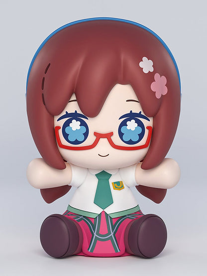 Sitting anime figure in school uniform with red glasses, brown hair, and flower-shaped eyes on color background