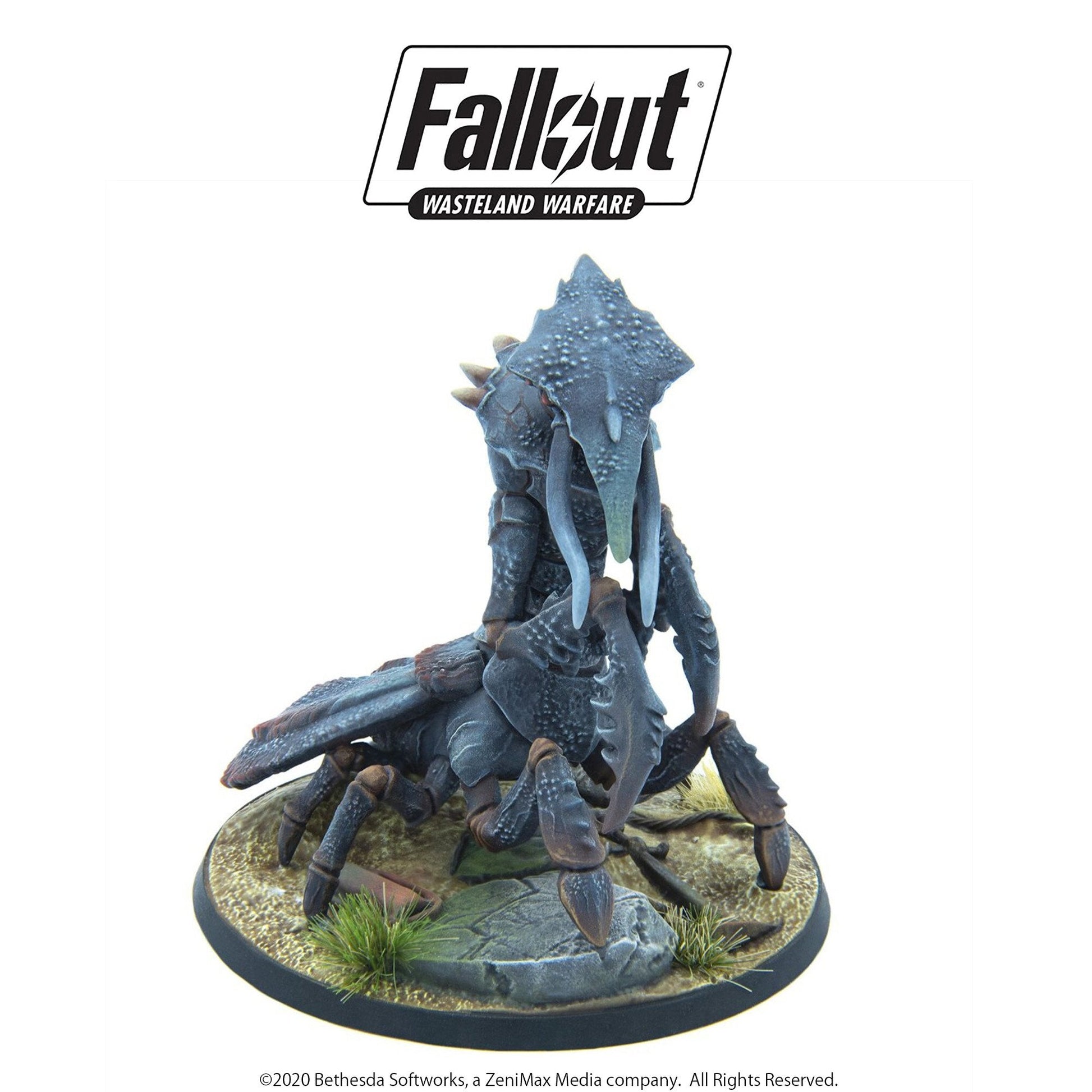 Fallout: Wasteland Warfare Radscorpion miniature: A dark, armored, multi-legged creature with large pincers on a desert base