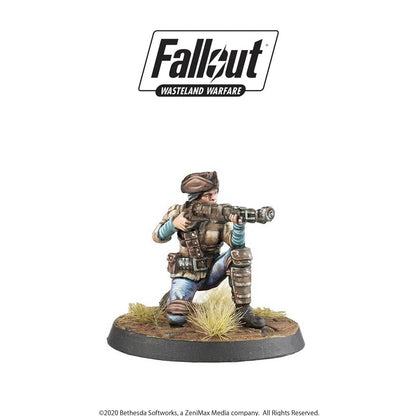 Painted Fallout Wasteland Warfare miniature of a female wasteland survivor kneeling and aiming a rifle.