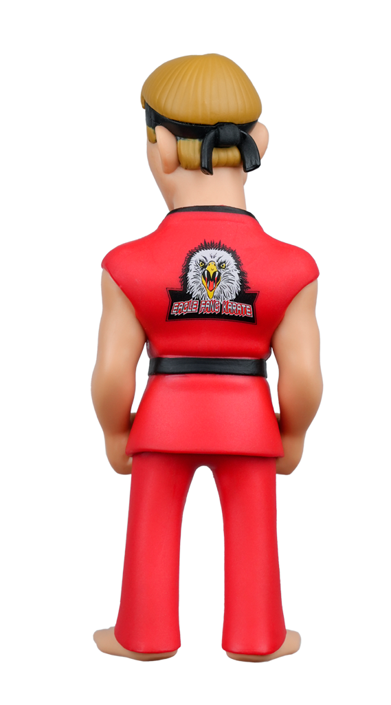 Back view of a blonde figure in a red karate gi with a black belt and an Eagle Fang Karate eagle design