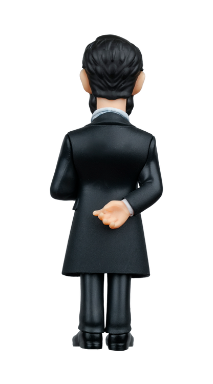 A MINIX President Abraham Lincoln figure is viewed from the back showcasing his dark hair black suit and hands clasped behind him