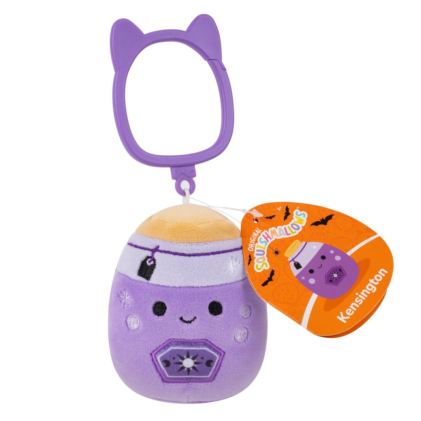 Purple egg-shaped plush keychain with smiling face, sun symbol, and cat ear clip with tag