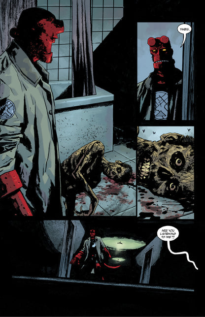 Hellboy discovers a bloody, dismembered corpse on a bathroom floor, reacting with "Yikes"