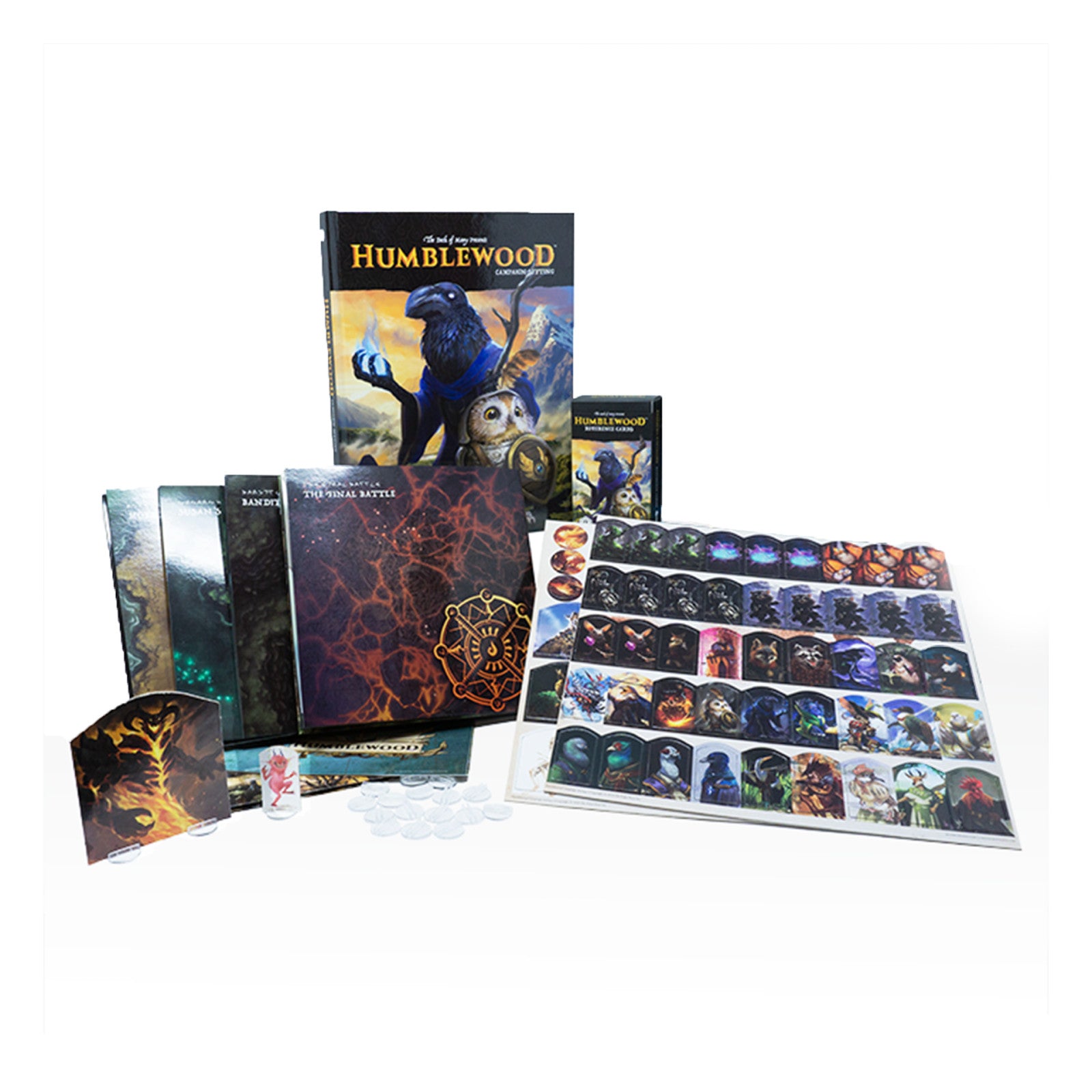 Unboxed Humblewood tabletop RPG set: main book with raven & owl, adventure books, and various character tokens.