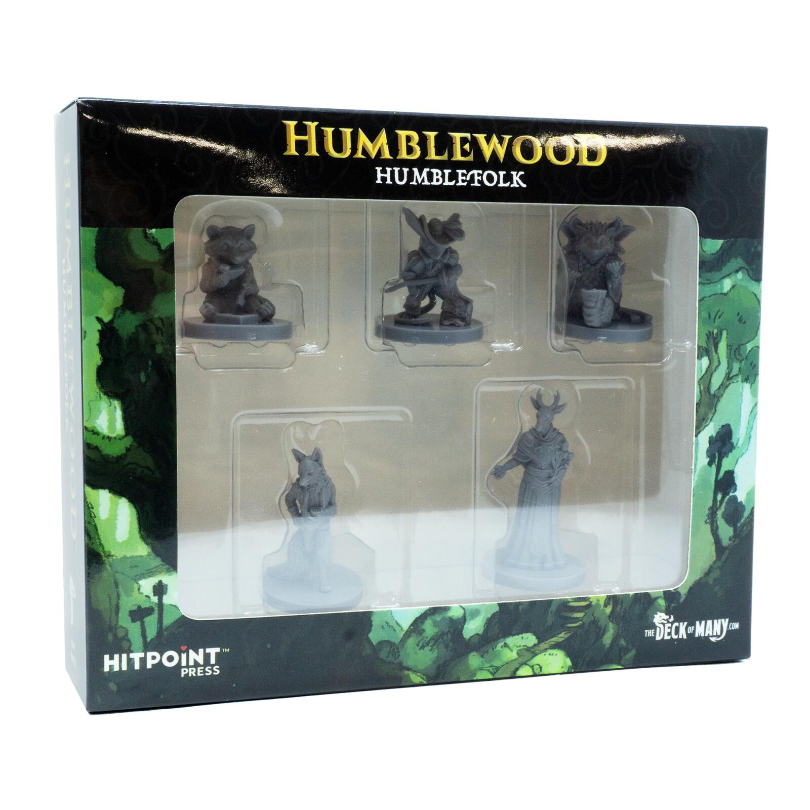 A Humblewood Humblefolk box containing five gray, unpainted anthropomorphic animal miniatures, visible through a clear window.