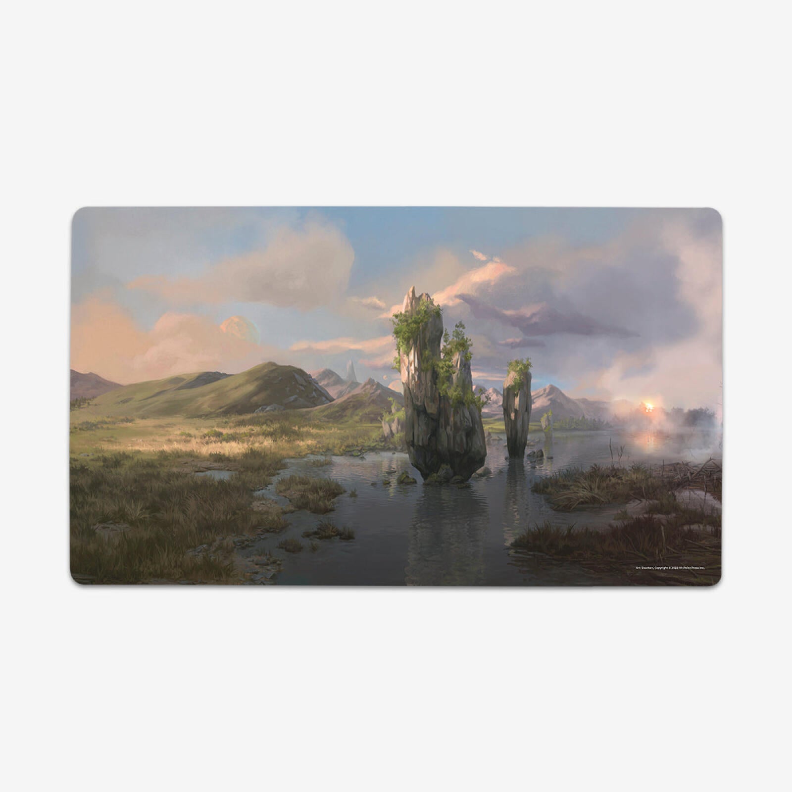 Fantasy playmat art: Jagged, green-topped rock formations rise from a misty lake in a marshy landscape with mountains and sunset