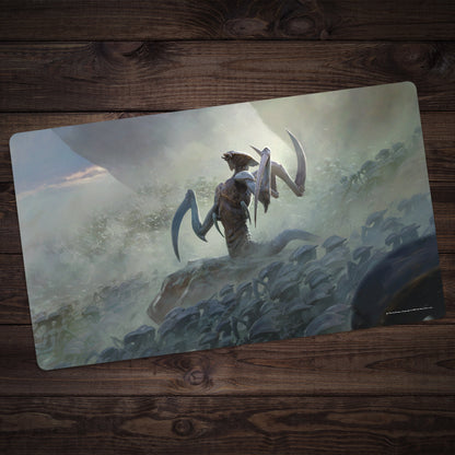 The Skittering Swarm Playmat displays a powerful armored insectoid creature observing a dense horde of smaller dark insects across a hazy landscape