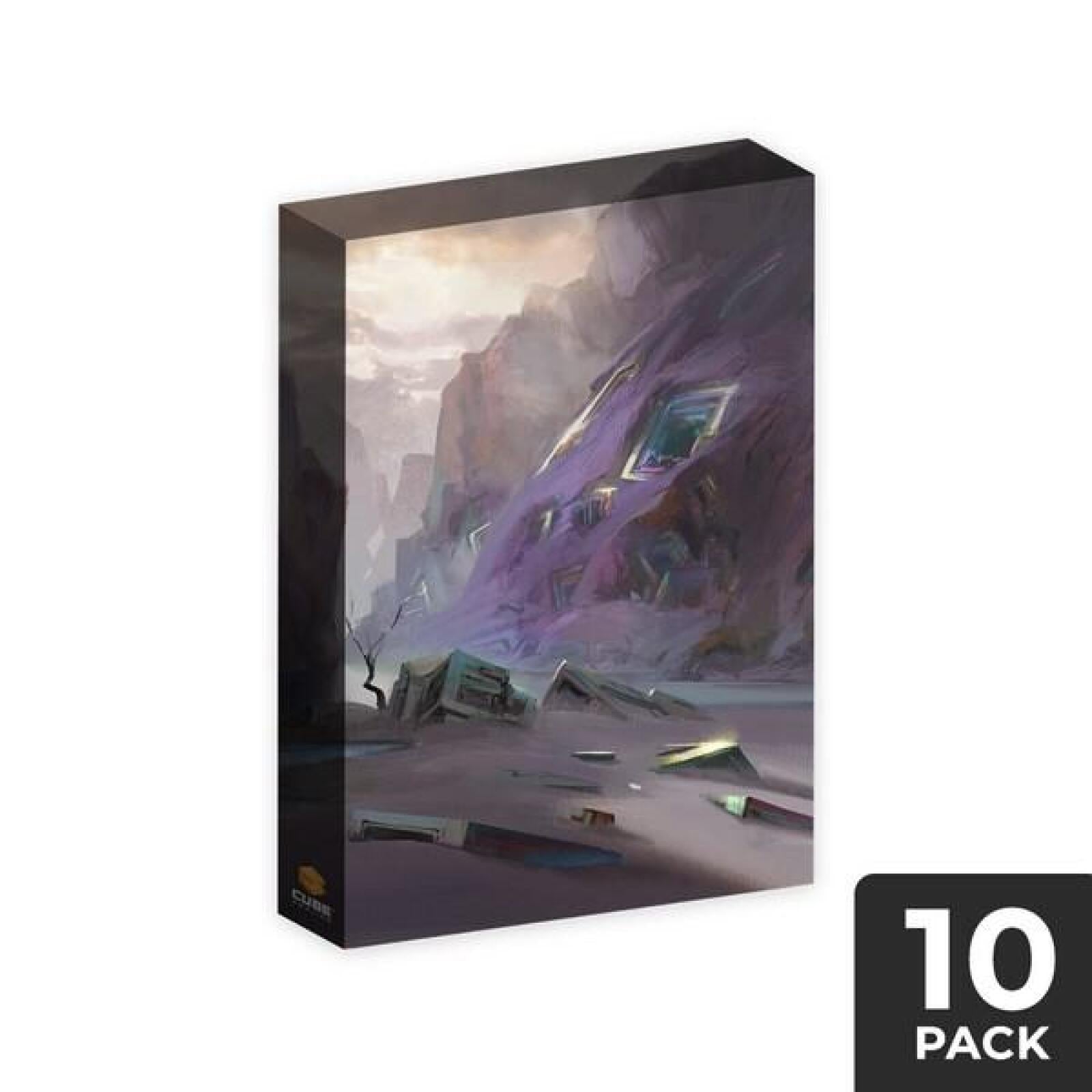 A product box with fantasy art: desolate purple mountains, ancient ruins, and a bare tree