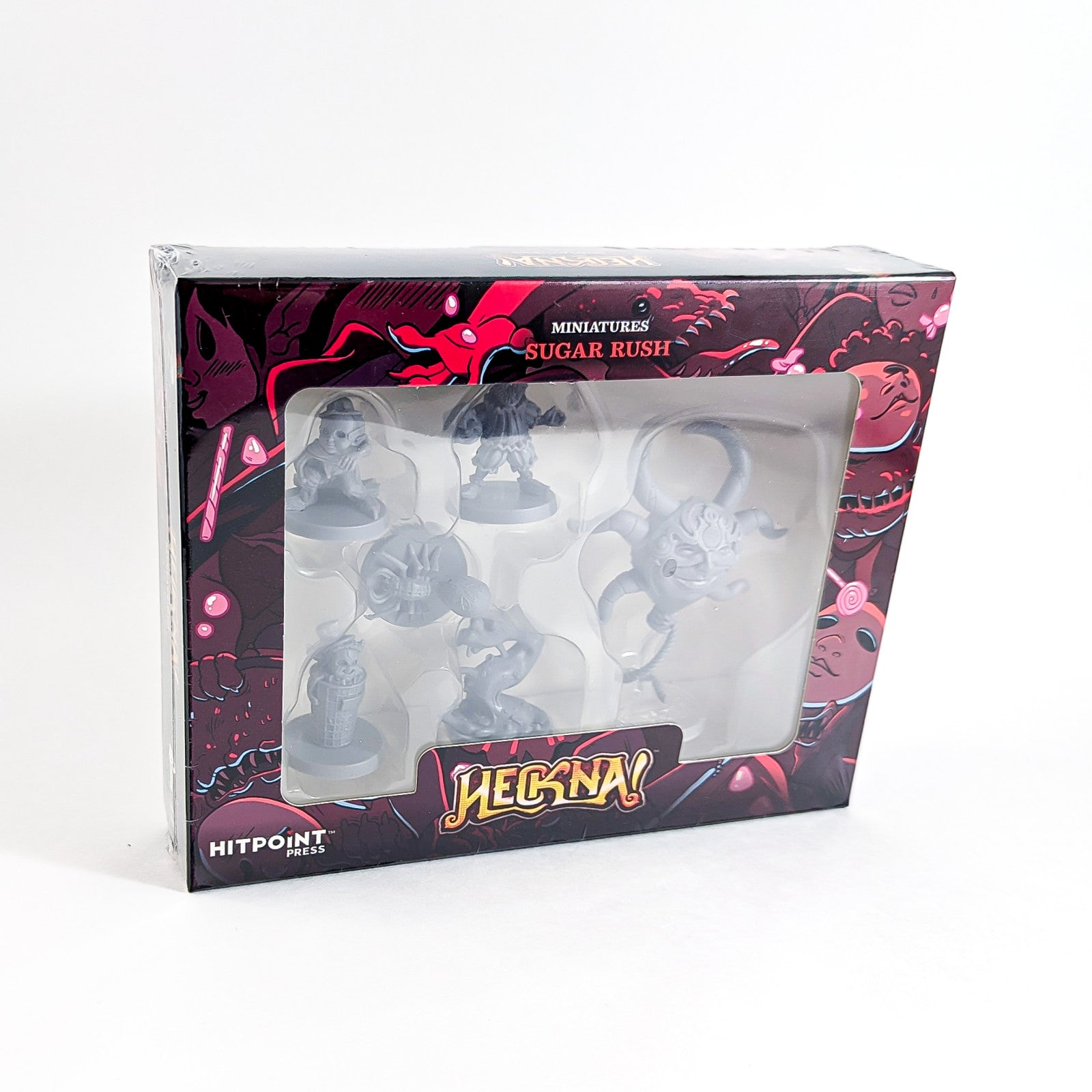 Hechma! "Sugar Rush" miniatures box set with a clear window showing six unpainted grey fantasy figures.
