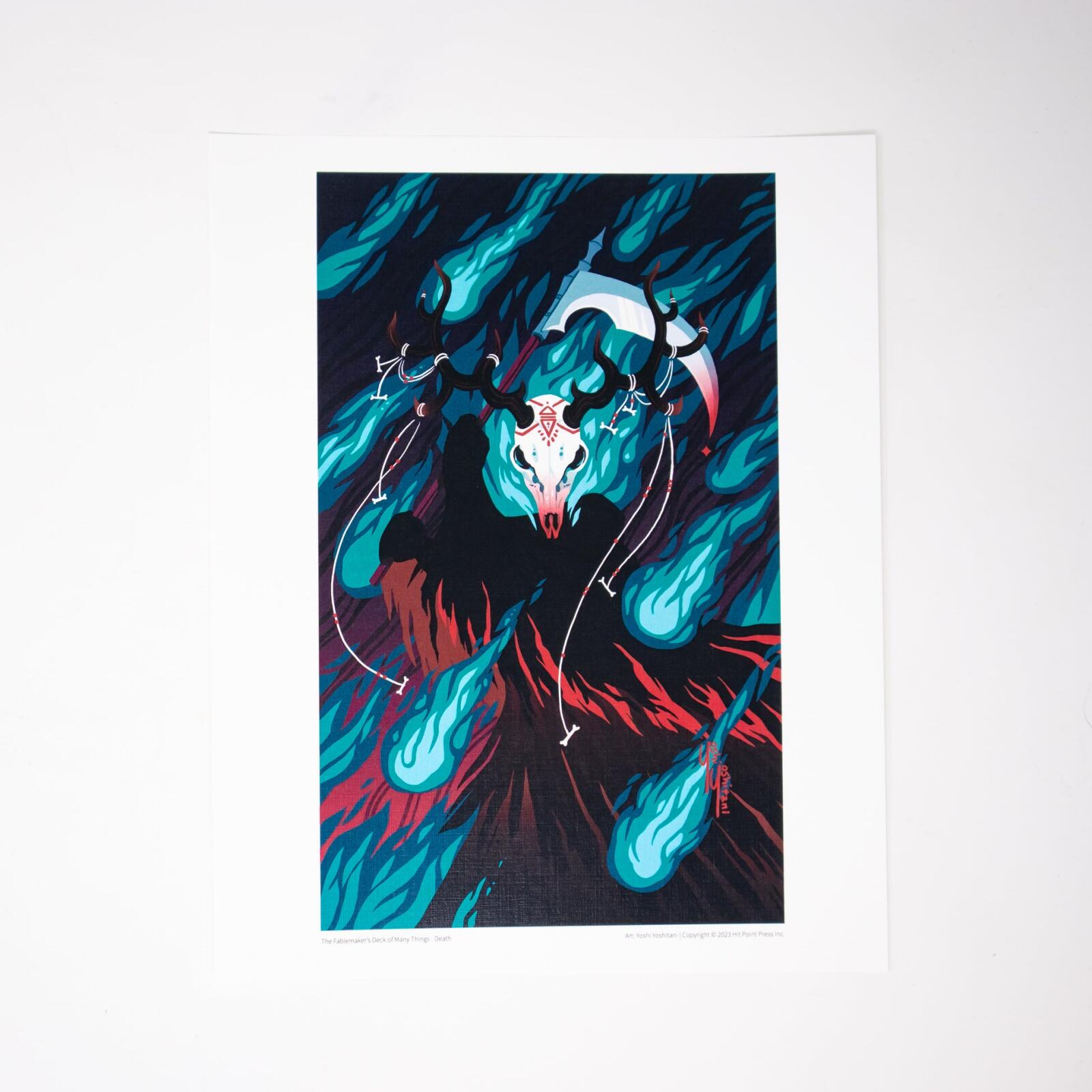 Stylized hooded Death figure with a deer skull mask, antlers, and scythe, amidst teal flames