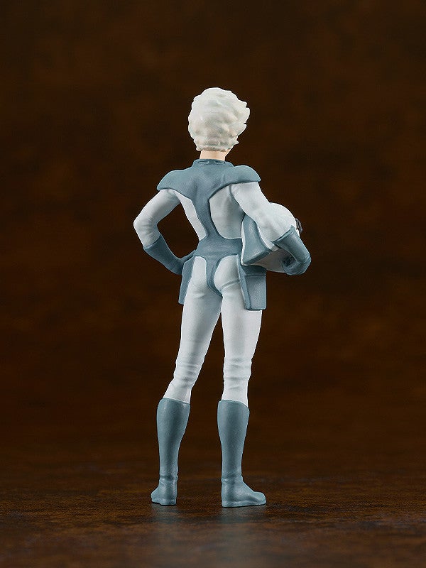 Back view of a female pilot figurine in a white and blue uniform, holding a helmet