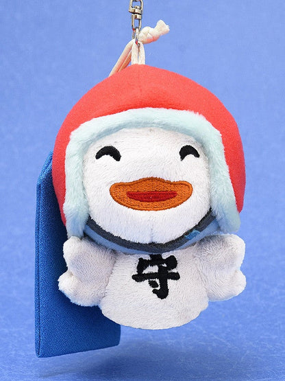 Back view of Oddtaxi plush keychain showing charm details