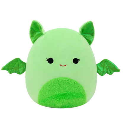 A light green Squishmallow plush with shiny green ears and wings, black eyes, a red smile, and a fuzzy green belly