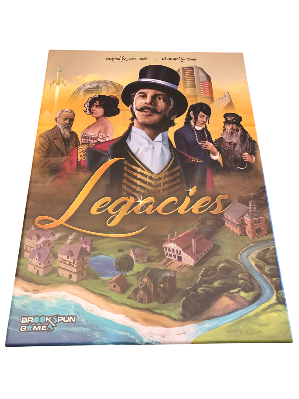 Legacies board game box, a top-hatted man, diverse characters, a rocket, and a landscape with a town and river