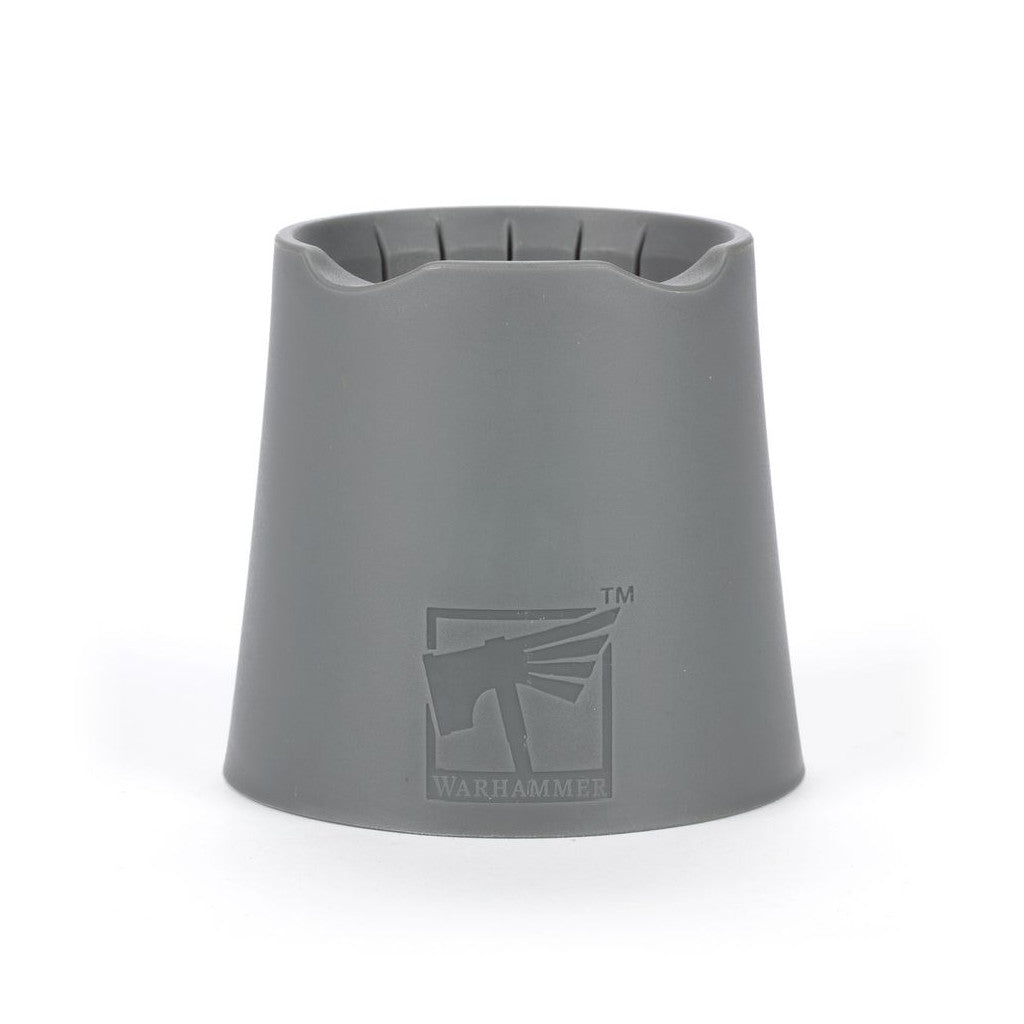 Gray Warhammer water pot holder or sprue catcher tool with recessed top slots, featuring the embossed logo