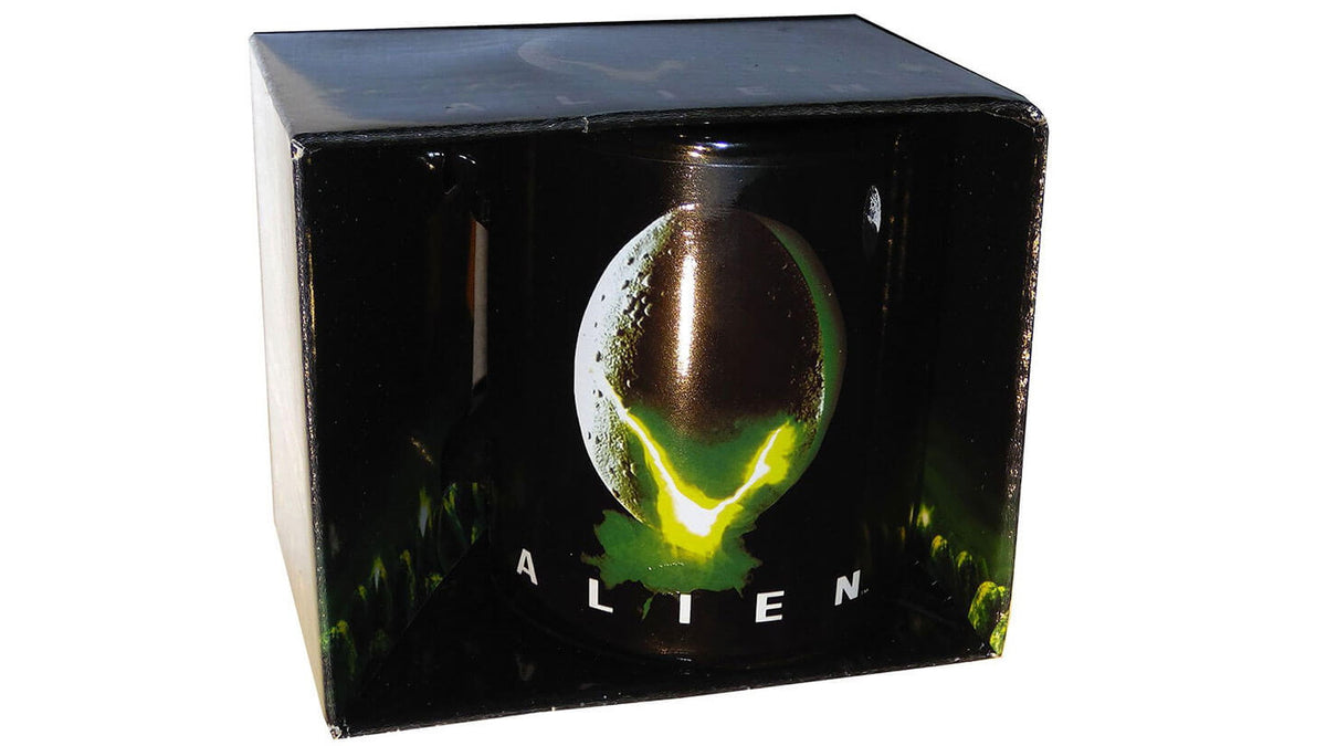 Black box displaying an Alien-themed mug with a glowing Xenomorph egg silhouette and the logo