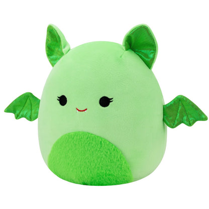 A light green Squishmallow plush toy with black eyes, a red smile, sparkly green ears, wings, and a fuzzy belly