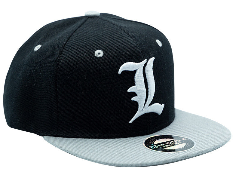 Black flat-bill cap with white embroidered gothic-style initial "L" and grey brim