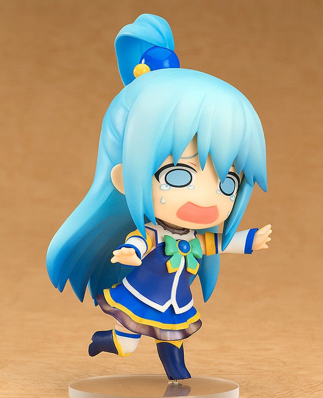 Good Smile Company Konosuba Nendoroid Aqua figure in blue dress crying with mouth wide open and arm extended
