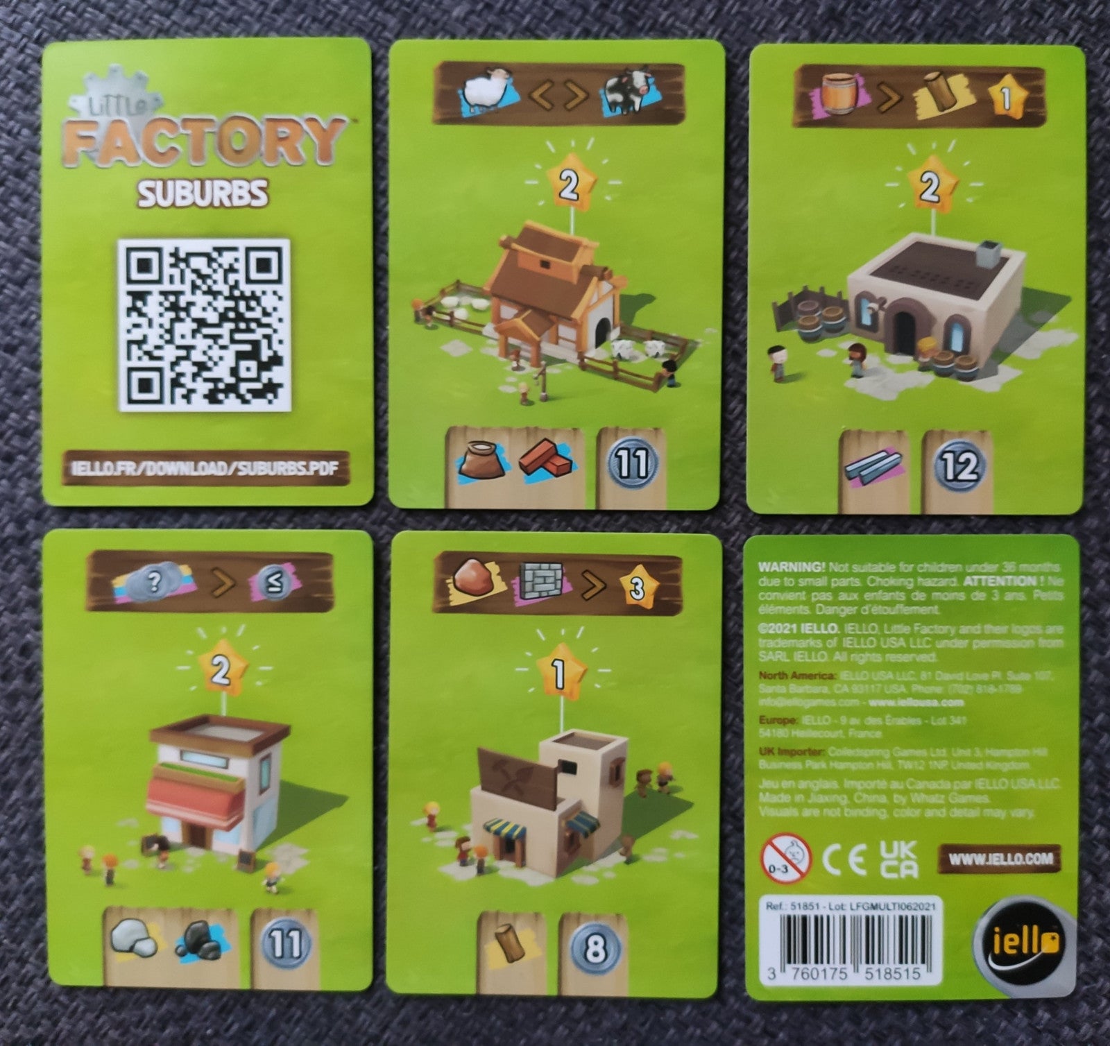 Suburbs' Goodie Card featuring vibrant artwork of a small residential area with houses, trees and pathways