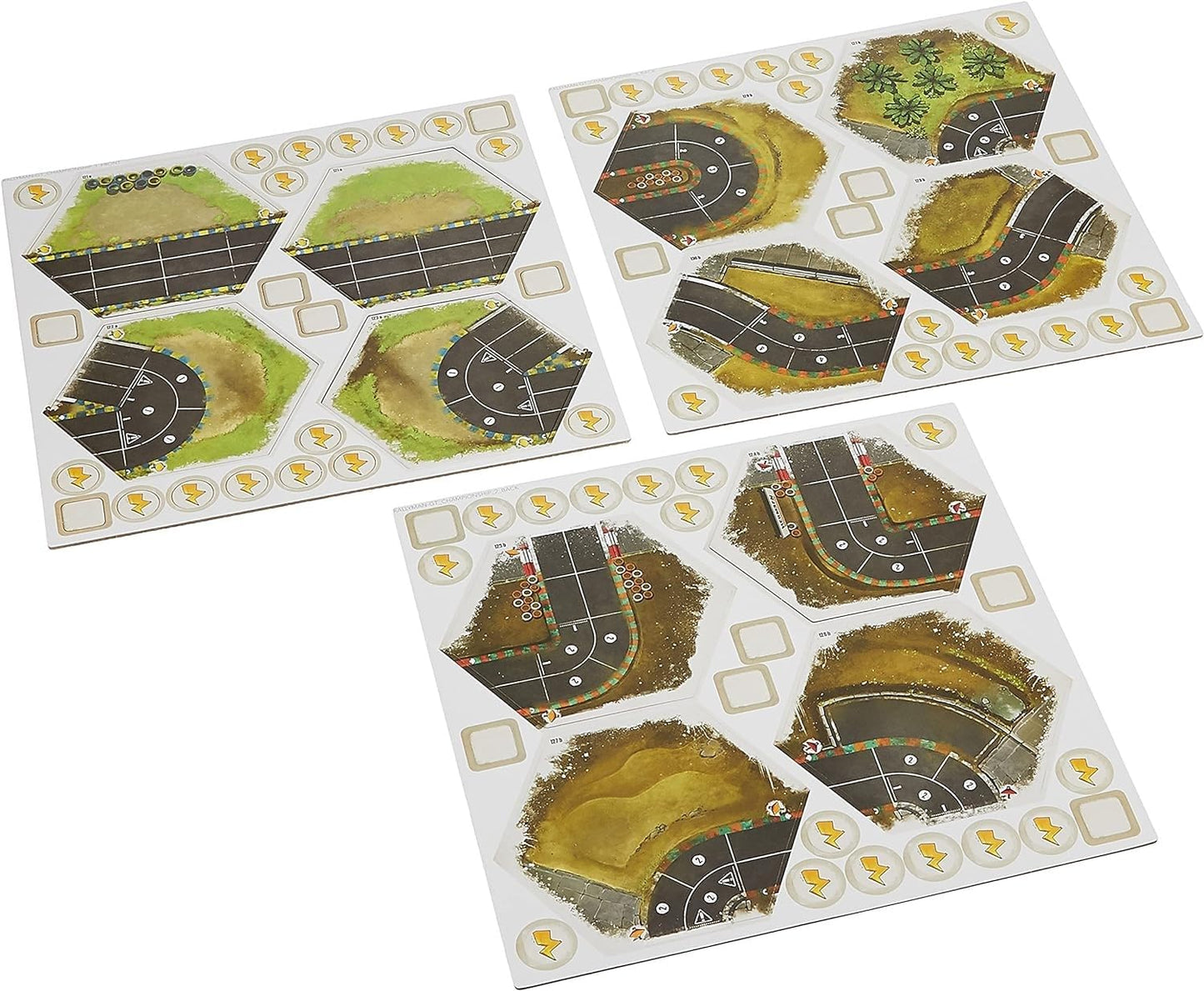 Three sheets of Rallyman GT board game tiles feature various hexagonal race track sections, straight roads, curves, and wooded areas, with smaller tokens