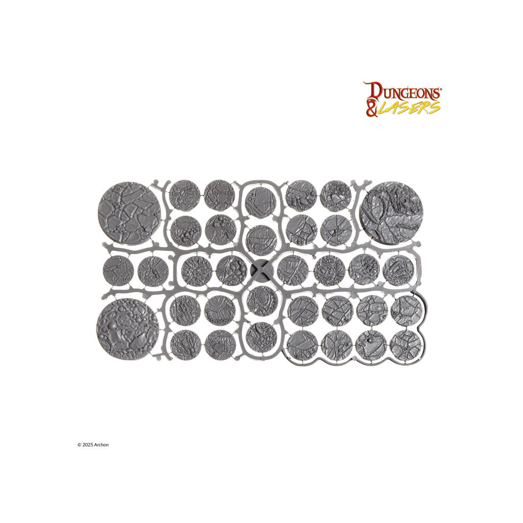 Unpainted sprue of textured circular terrain miniature bases, including small and large sizes