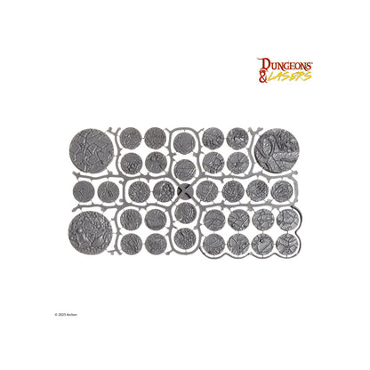 Unpainted sprue of textured circular terrain miniature bases, including small and large sizes