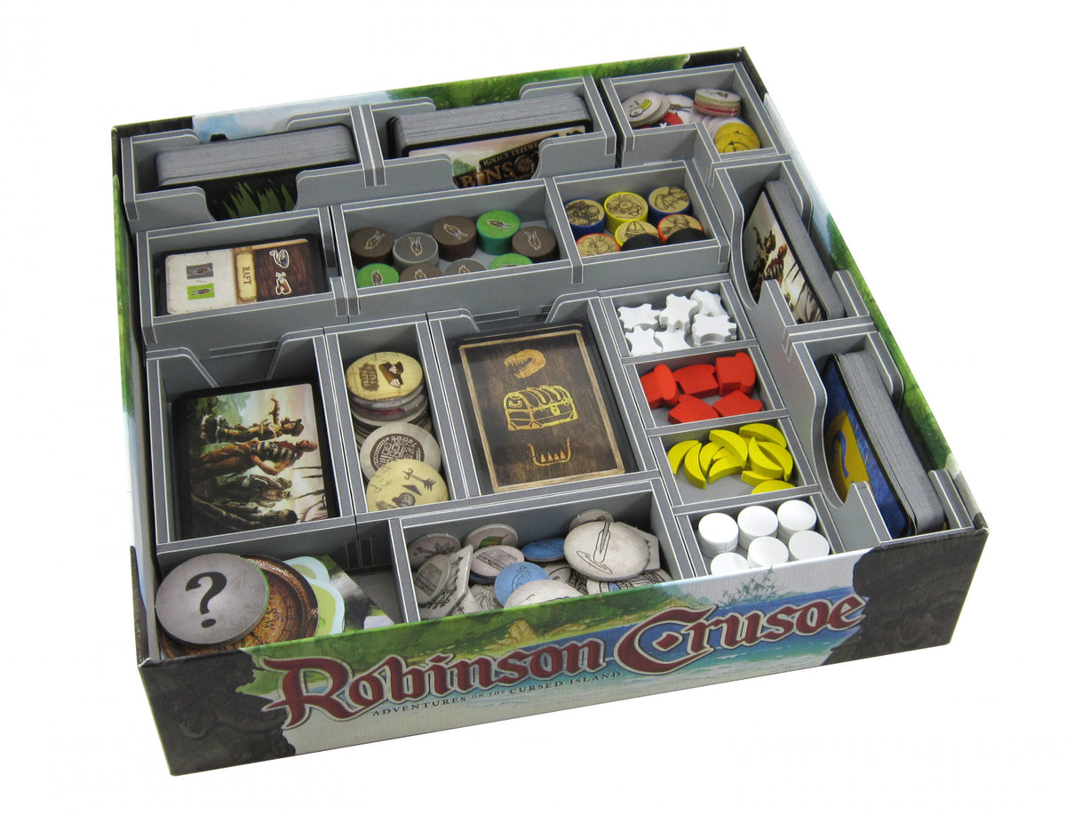 Insert with game components organized in trays