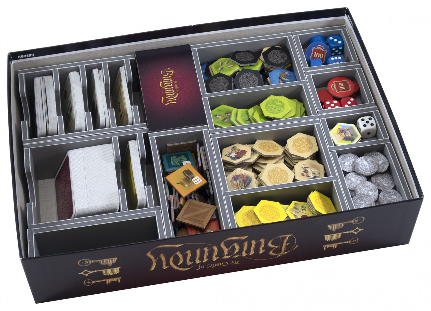 Side view of the Folded Space insert with game pieces and cards arranged inside