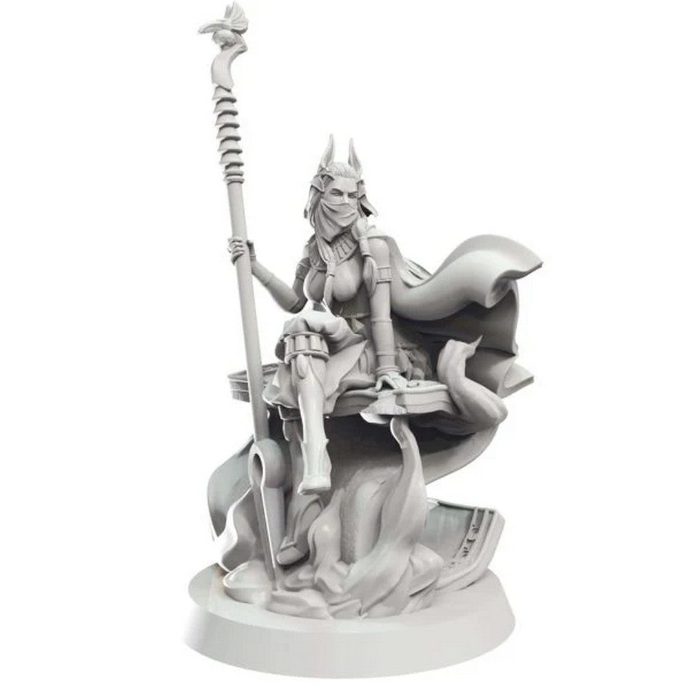 Grey fantasy miniature of a masked, horned female figure with a cape, seated holding a staff