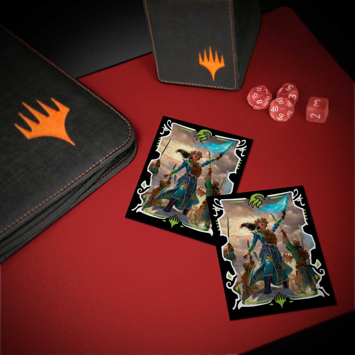 Two Magic: The Gathering cards showing a fantasy warrior with a blue banner, on a red surface with MTG accessories and dice