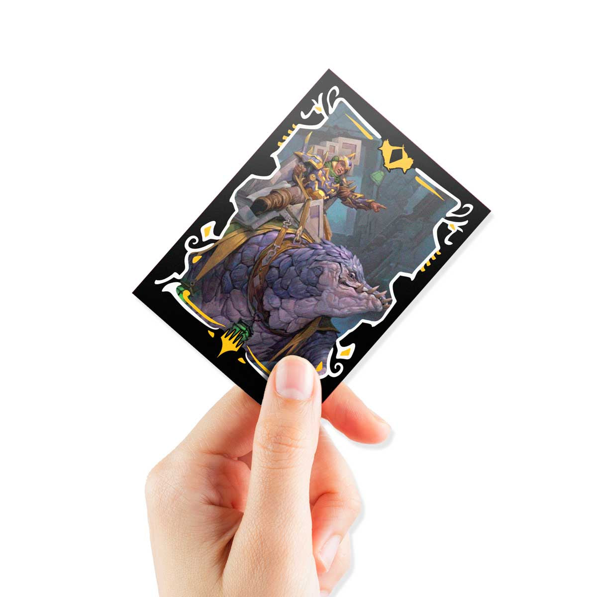 Hand holding a fantasy trading card showing an armored warrior riding a large purple scaled creature
