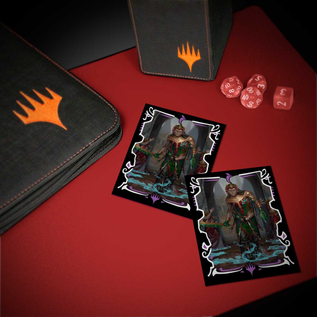 Two Magic: The Gathering art cards featuring a spellcasting character on a red surface with branded binder, box, and dice