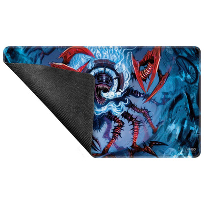 Gaming mat with a fierce monster: jagged teeth, glowing blue energy, spiky red legs