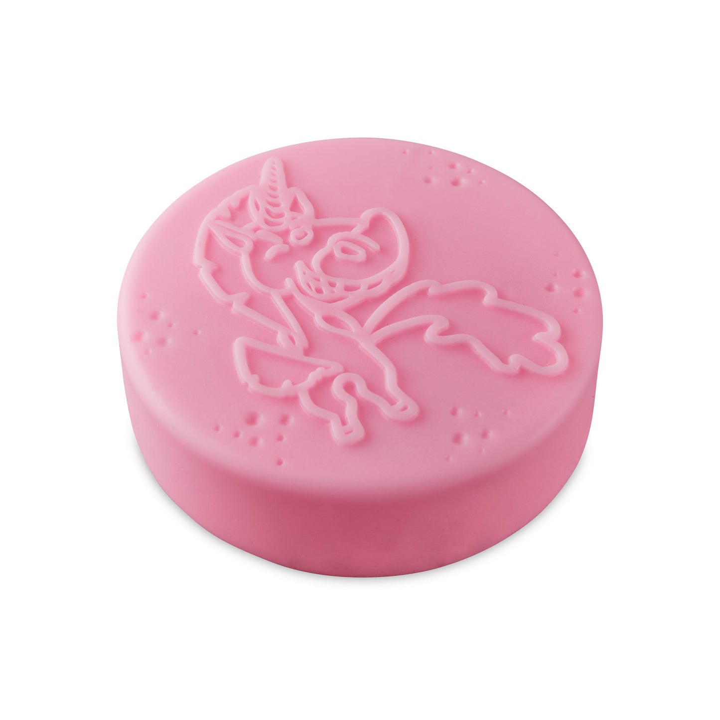 Pink circular bath bomb with a raised unicorn design and small scattered bubbles