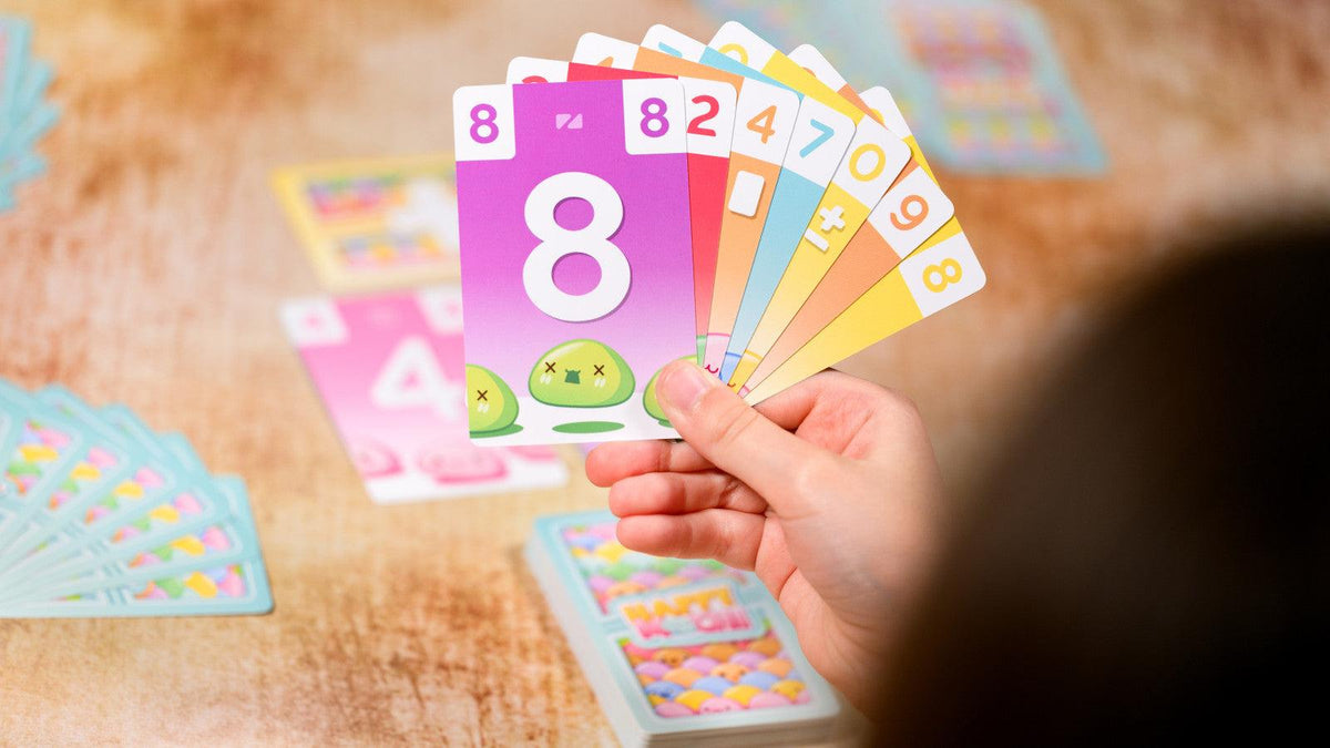 VR Distribution Happy Mochi card game holding cards in hand