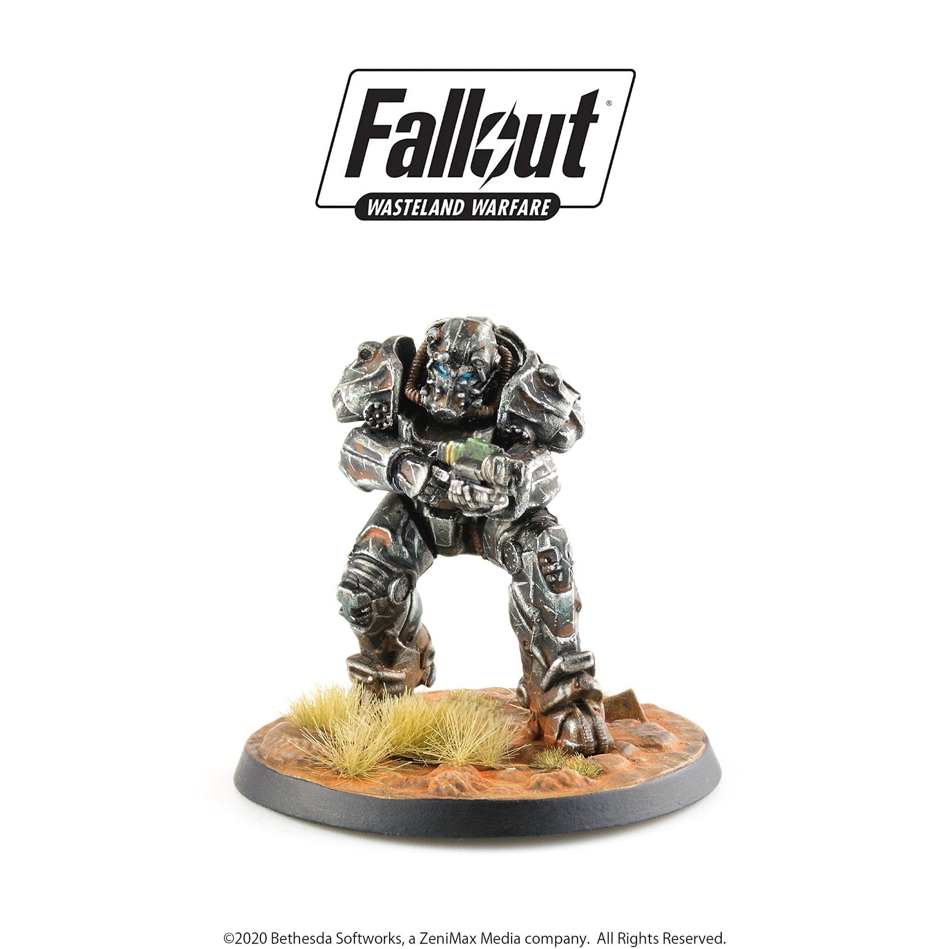 Fallout Wasteland Warfare miniature: Weathered Power Armor with blue eyes, holding an energy weapon on a desert base