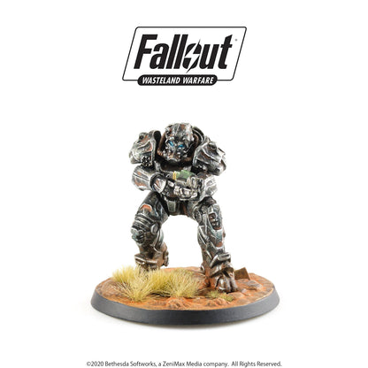 Fallout Wasteland Warfare miniature: Weathered Power Armor with blue eyes, holding an energy weapon on a desert base