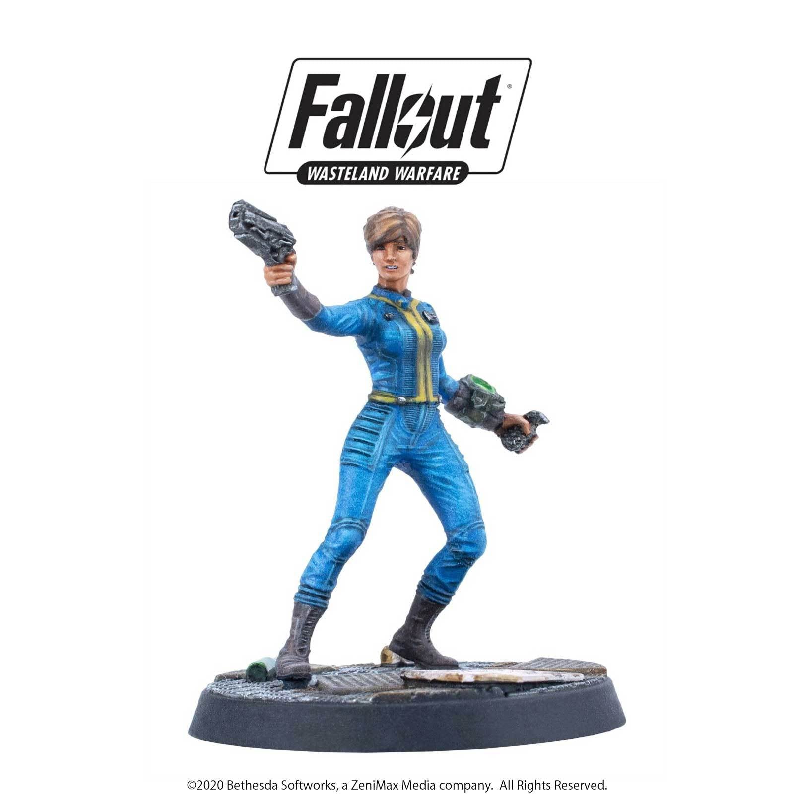 Fallout Wasteland Warfare miniature: Woman in blue Vault Suit holds a pistol and a Pip-Boy, ready for action